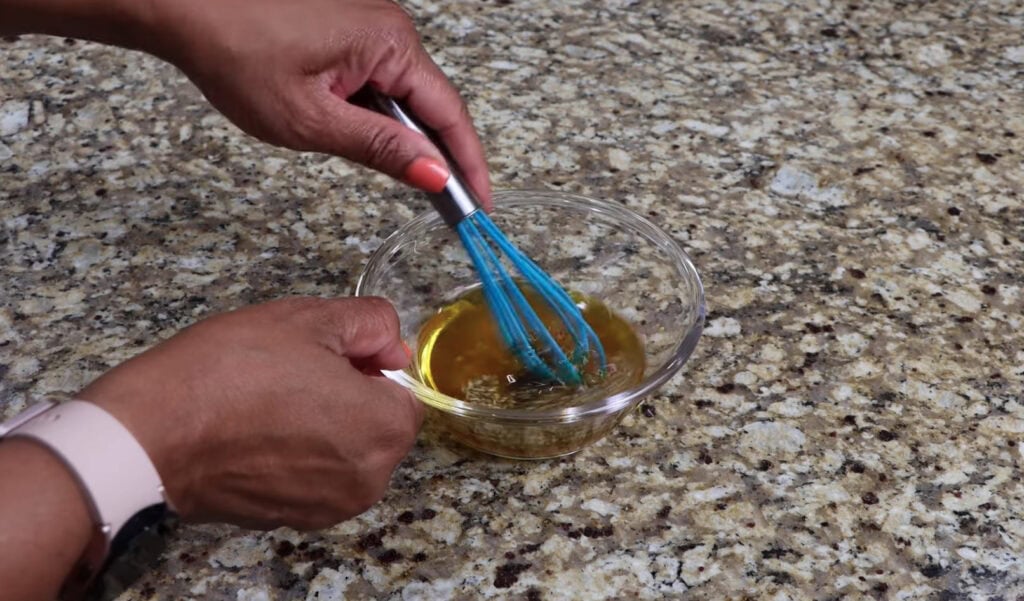 Mixing the Vinaigrette for Greek Salad