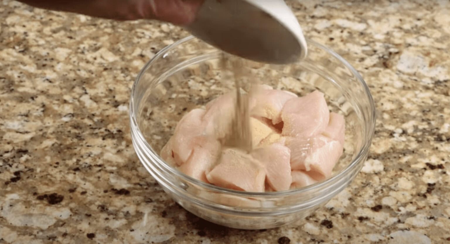 Seasoning the Chicken for Sweet and Sour Chicken