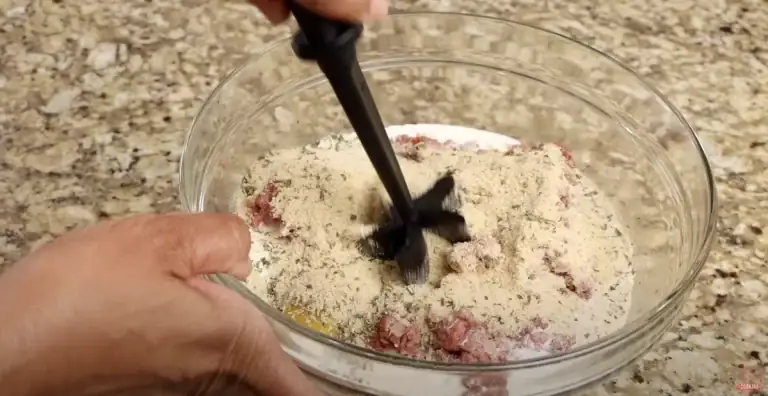 Mixing all Ingredients for Meatloaf
