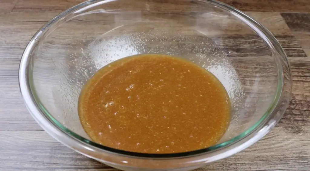 Mixing all ingredients for pecan pie filling