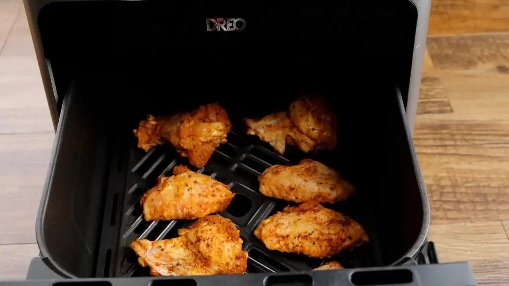air frying the chicken for crispy honey cajun wings