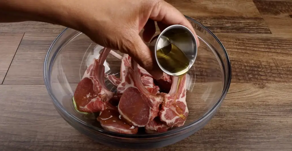 Adding Oil to Lamb Chops