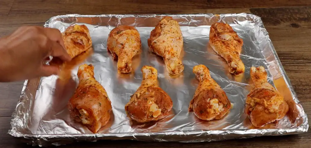 Seasoned Chicken Legs on a Baking Dish