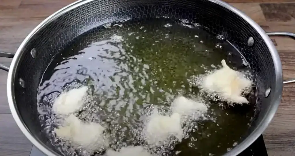 Frying the Chicken for Crispy Honey Chicken
