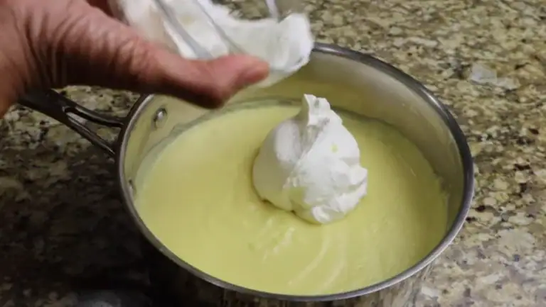 Adding Whipping Cream for Chessman Banana Pudding