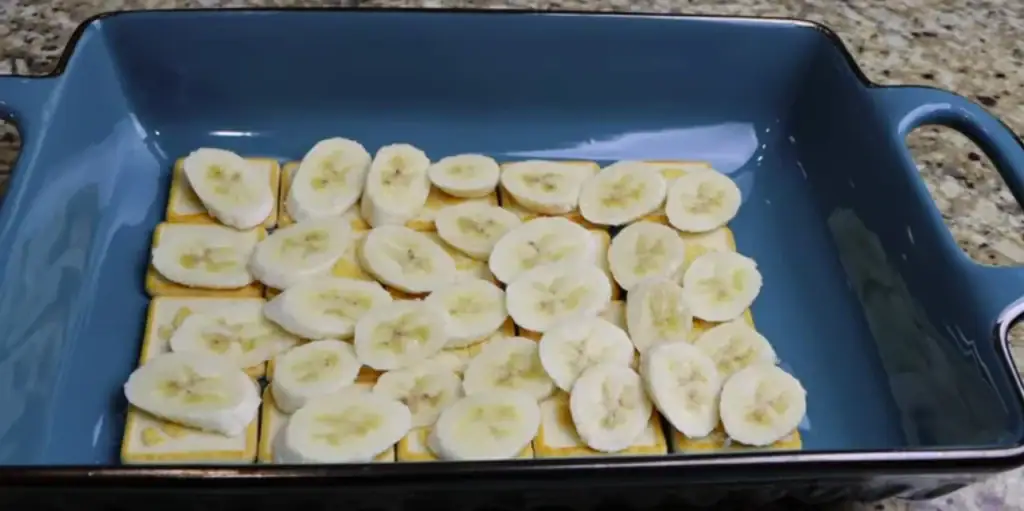 Layering Bananas for Chessman Banana Pudding