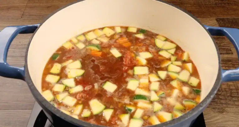 Adding the White beans and pasta to the Italian Sausage Soup