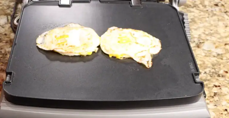 Making the eggs for breakfast sandwich