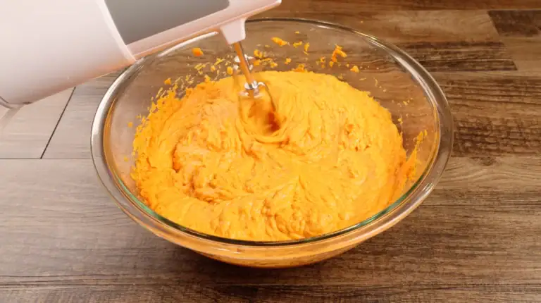 Mixing all ingredients for Brown Butter Sweet Potato Pie