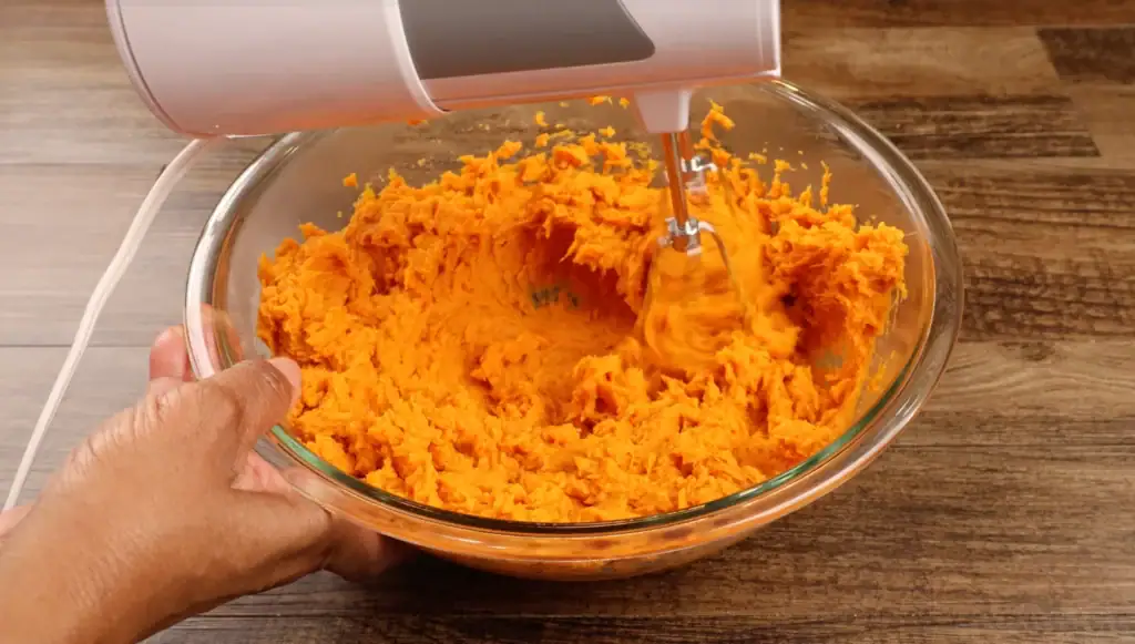 Mixing ingredients for Brown Butter Sweet Potato Pie