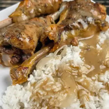 baked-turkey-legs-with-gravy-on-rice