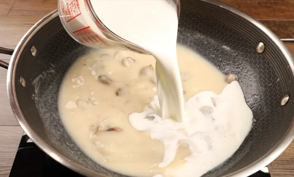 Adding the heavy cream for Chicken a la King