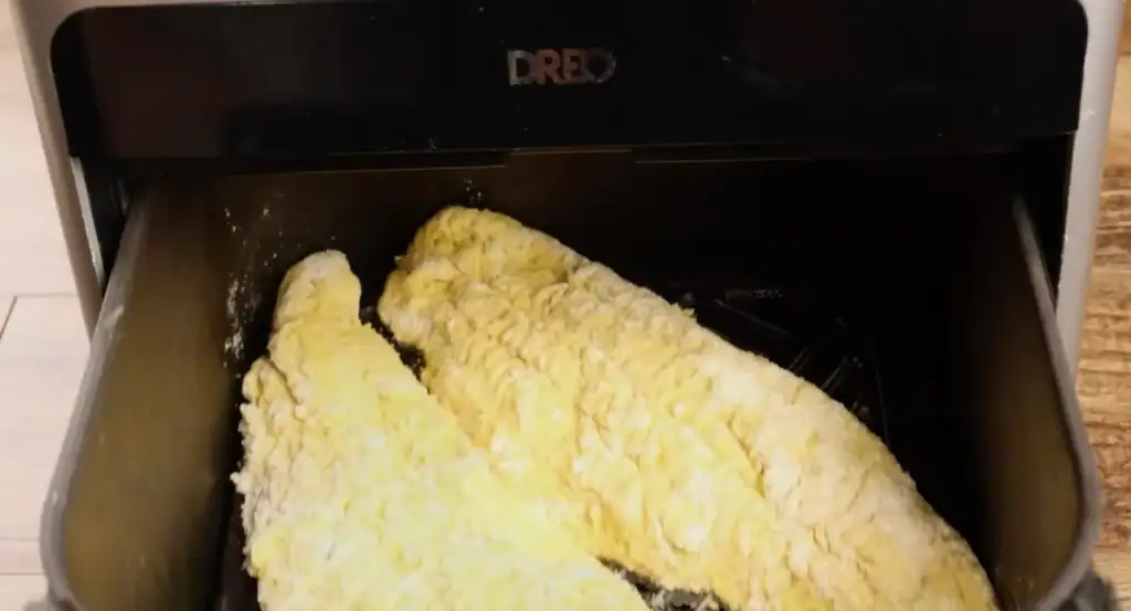 Placing Catfish in Preheated Air Fryer