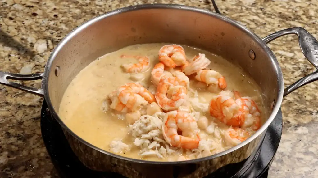 Returning the Scallops and Shrimp to the pan for Seafood Pasta