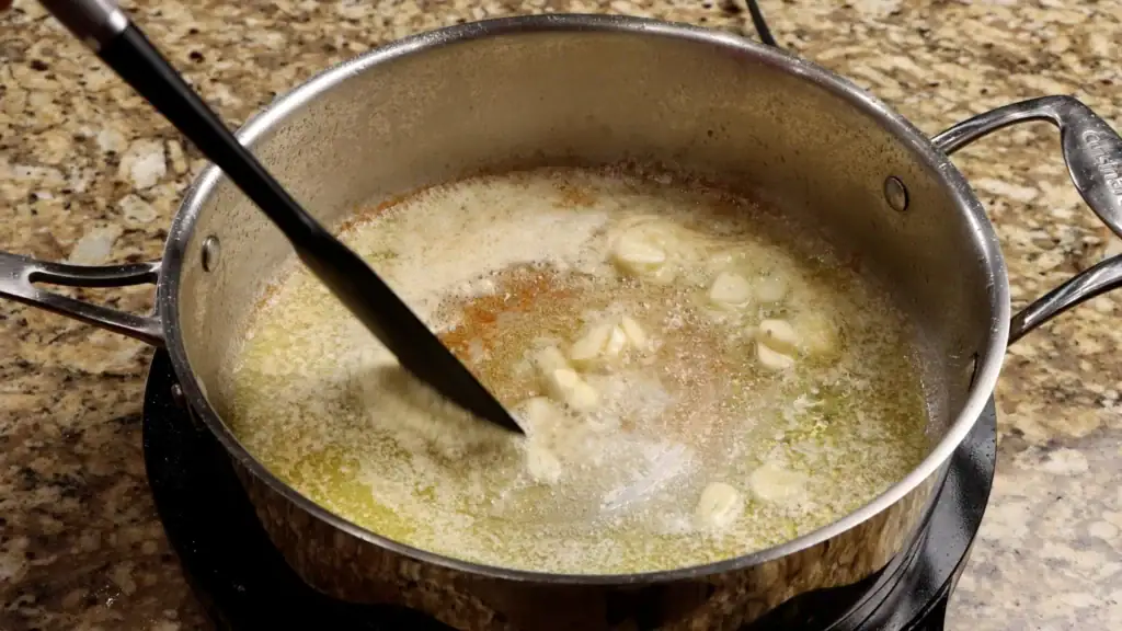 Sautéing the Garlic for Seafood Pasta