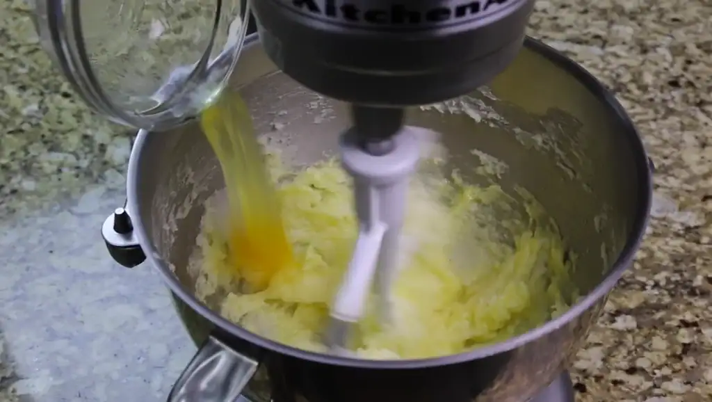 Adding the Egg to the Batter for Coffee Cake