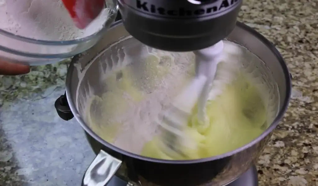 Adding the Flour to the Batter for Coffee Cake