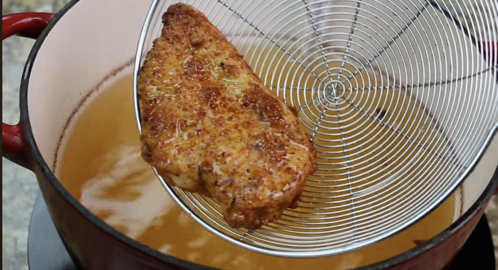 Frying the Chicken for Copycat Chick Fil A Sandwich