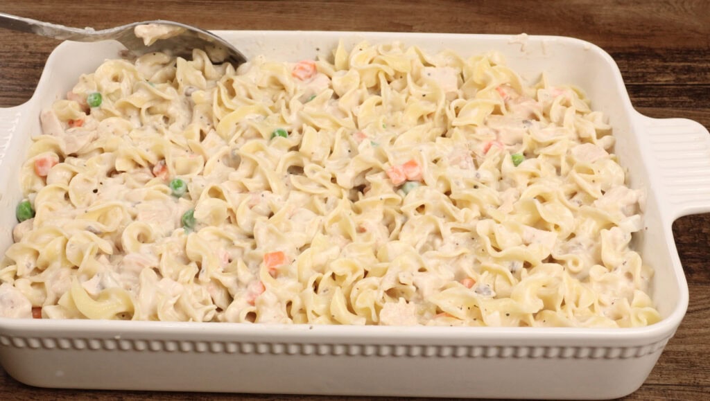 Mixing all ingredients for Chicken Noodle Casserole
