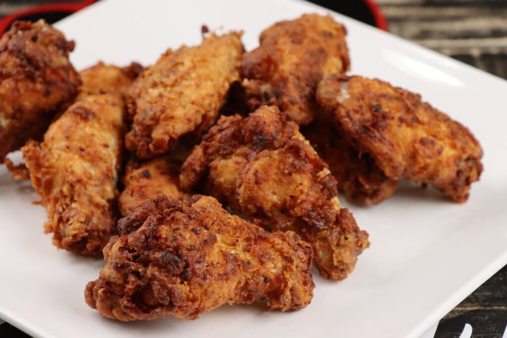 Ghost Pepper Wings on a white square plate