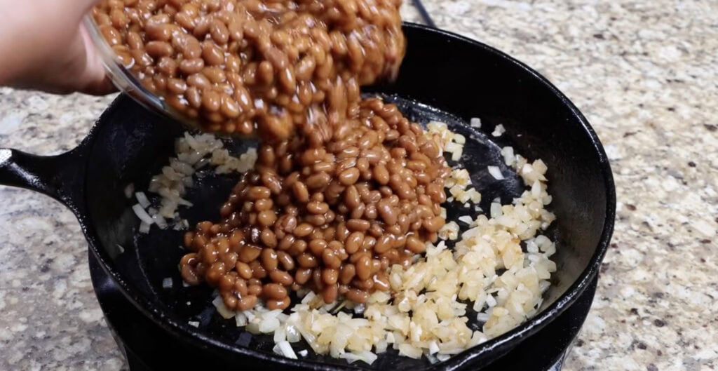 Adding the Beans to the Pan