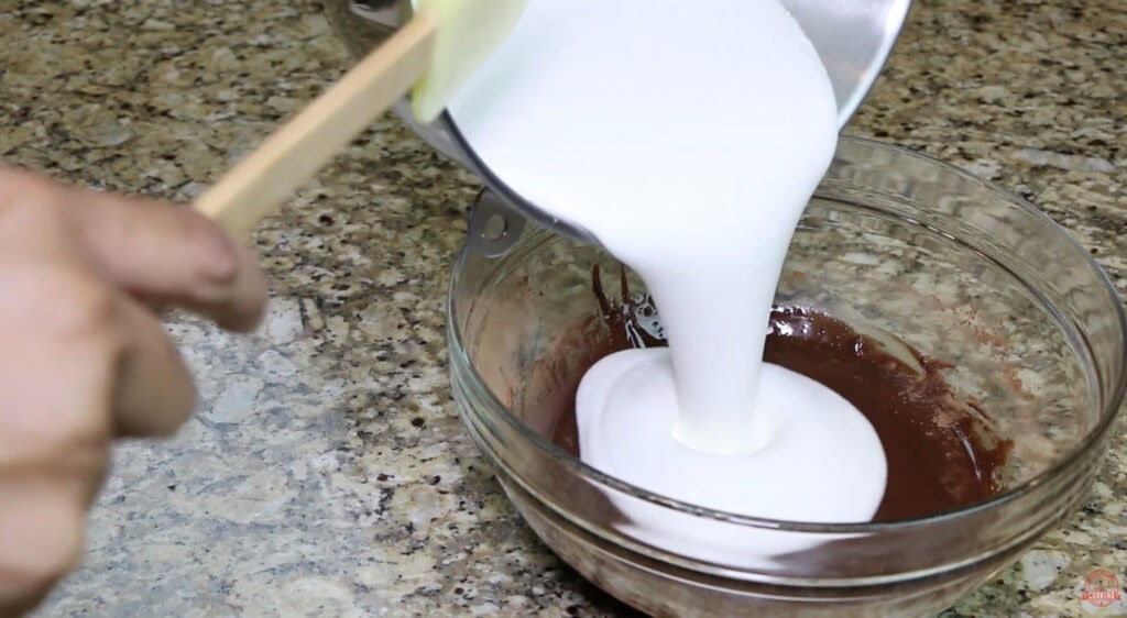 Adding the Whipped Cream to the Chocolate Mixture for Chocolate Ice Cream