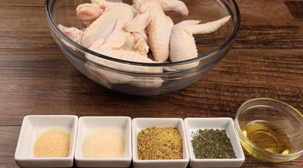 Ingredients for lemon Pepper Wings including, onion powder, garlic powder, lemon pepper seasoning, salt and black pepper